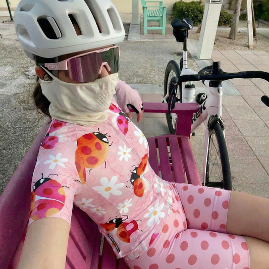 Woman Wearing Ladybug Meadow Spring Botanical Pro Aero Jersey Tailored with Stretch Fit for Race-Inspired Silhouette